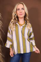 Model wearing the Olive & Blue Striped Button Down Top from Moda Boutique