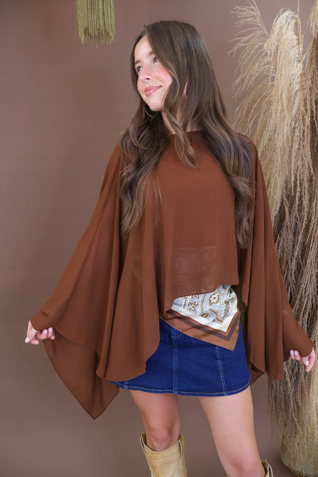 Chocolate sheer batwing poncho top layered over included cami