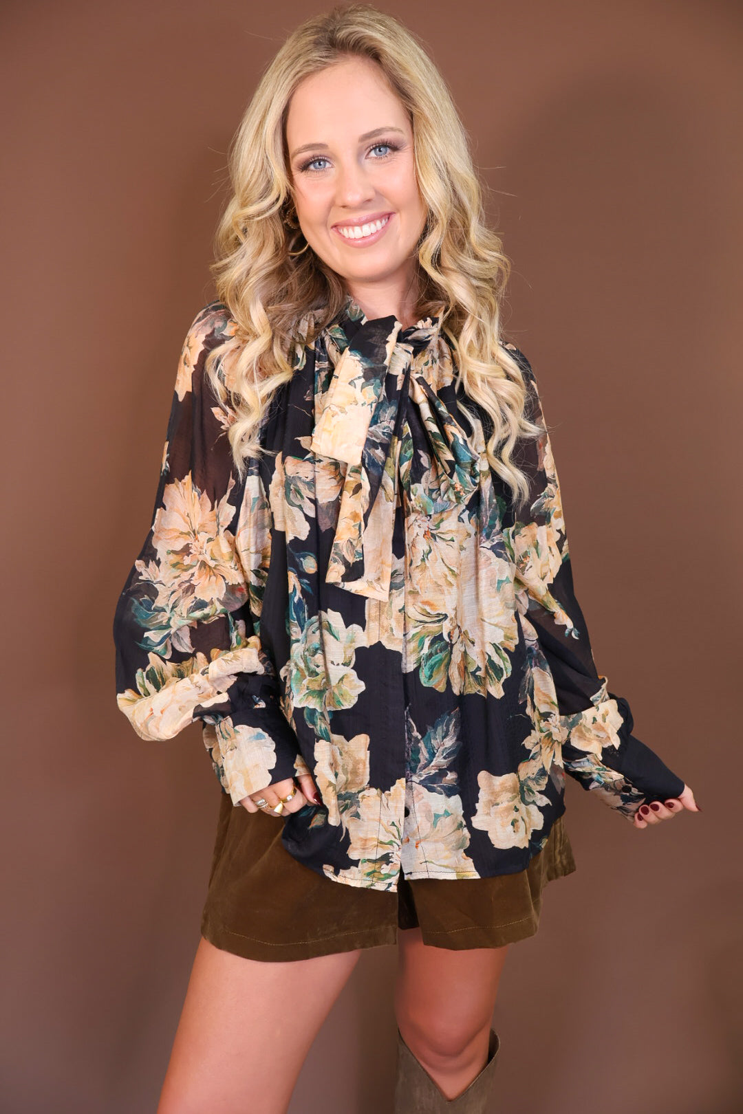 Black Floral Tie-Front Blouse — front view styled with olive shorts.