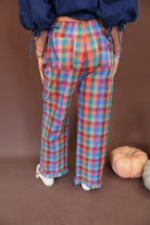 Multicolor Plaid Ruffle Hem Pants — back view.