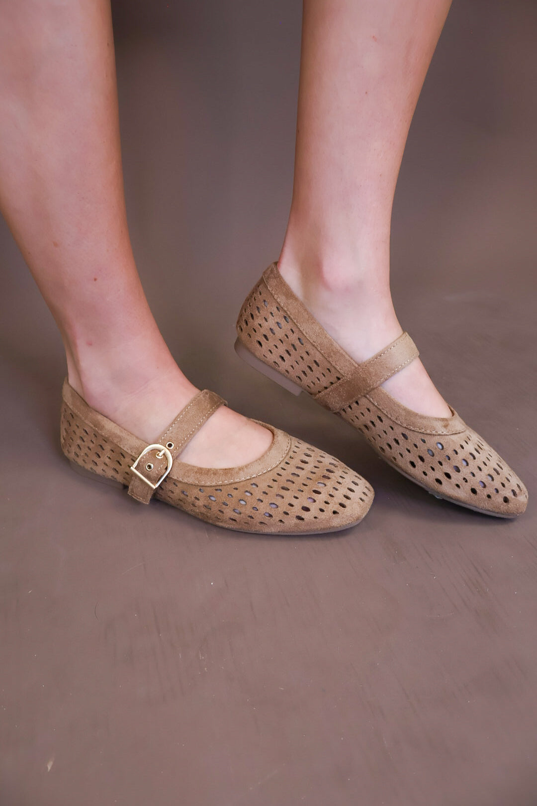 Model wearing the Brown Flat Mary Janes from Moda Boutique