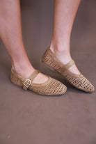 Model wearing the Brown Flat Mary Janes from Moda Boutique