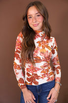 Ivory Floral Fitted Long Sleeve Mesh Top — front view.