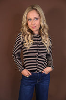 Black Striped Fitted Button-Front Top — front view with jeans.