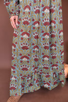 Sage And Burgundy Floral Long Sleeve Maxi Dress — close-up of long floral skirt.