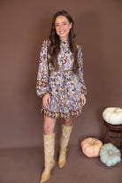 Floral Print Belted Long Sleeve Mini Dress — full outfit with tall boots.