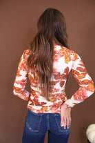 Ivory Floral Fitted Long Sleeve Mesh Top — back view.