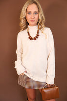 Oatmeal Mock Neck Tunic Sweater — front view.