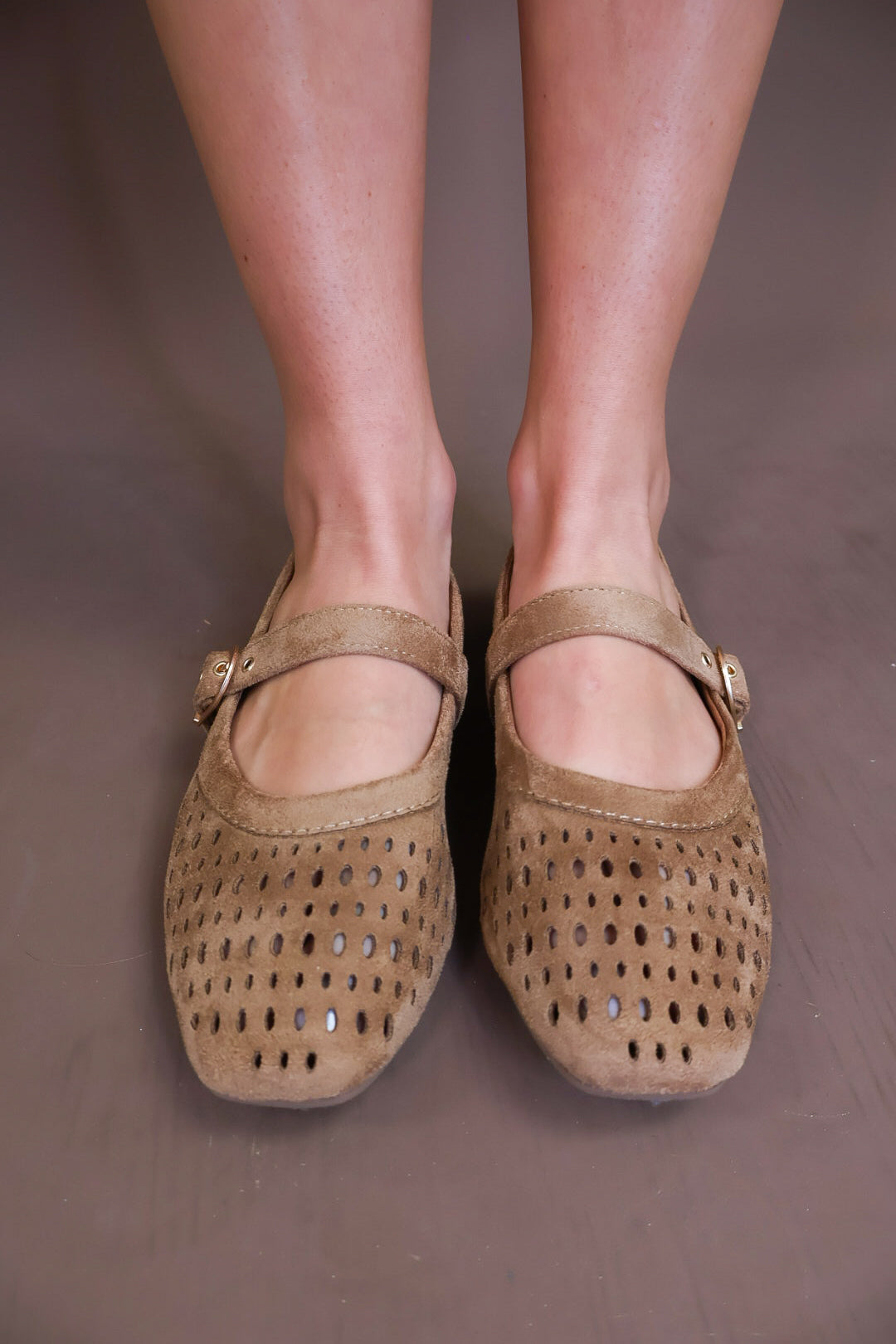 Model wearing the Brown Flat Mary Janes from Moda Boutique