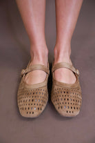 Model wearing the Brown Flat Mary Janes from Moda Boutique