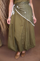 Model wearing the Olive Bubble Midi Dress with Scarf from Moda Boutique