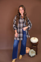 Plaid Button-Front Tunic Top — front view with jeans.