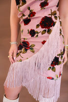 Blush velvet burnout floral dress with asymmetrical fringe hem