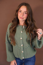 Olive Pom Pom Knit Cardigan — front view.