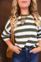 Model wearing the Short Sleeved Lightweight Sweater Top - Green Stripe from Moda Boutique
