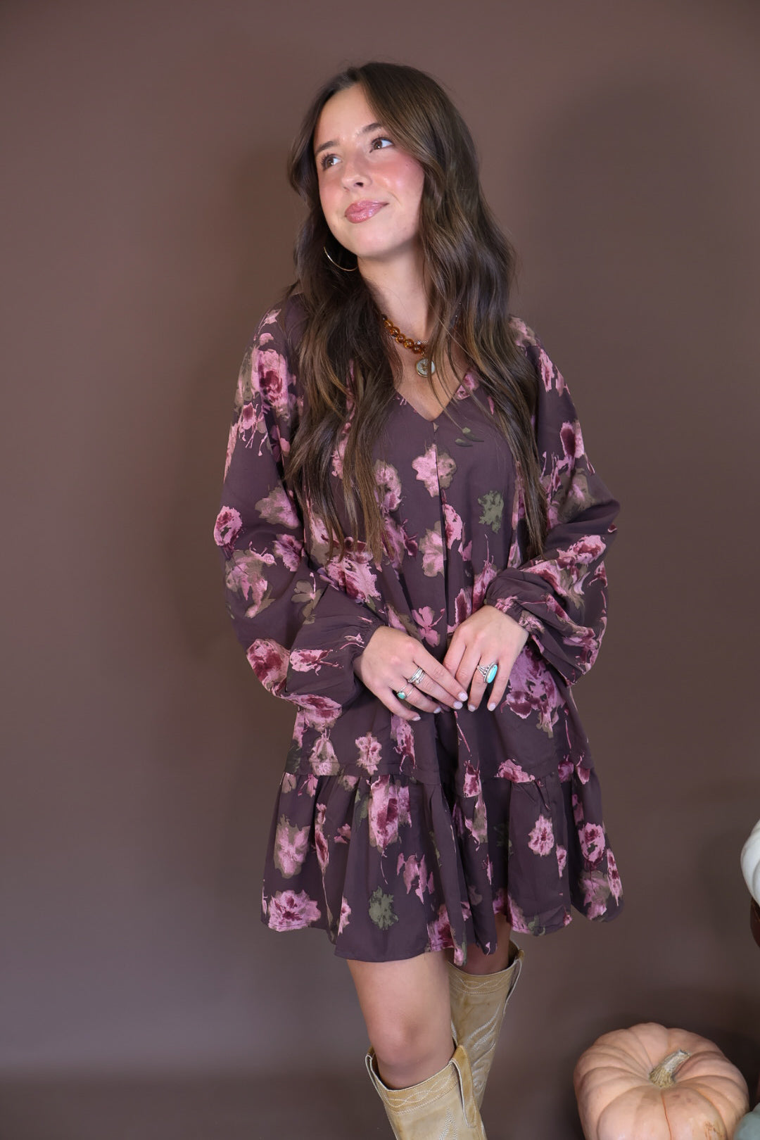 Brown Floral Tiered Babydoll Mini Dress — front view.