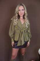 Martini Olive Striped Tie-Front Top — front view styled with a mini skirt.