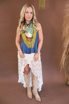 Cream lace skirt-overlay shorts with high-low hemline