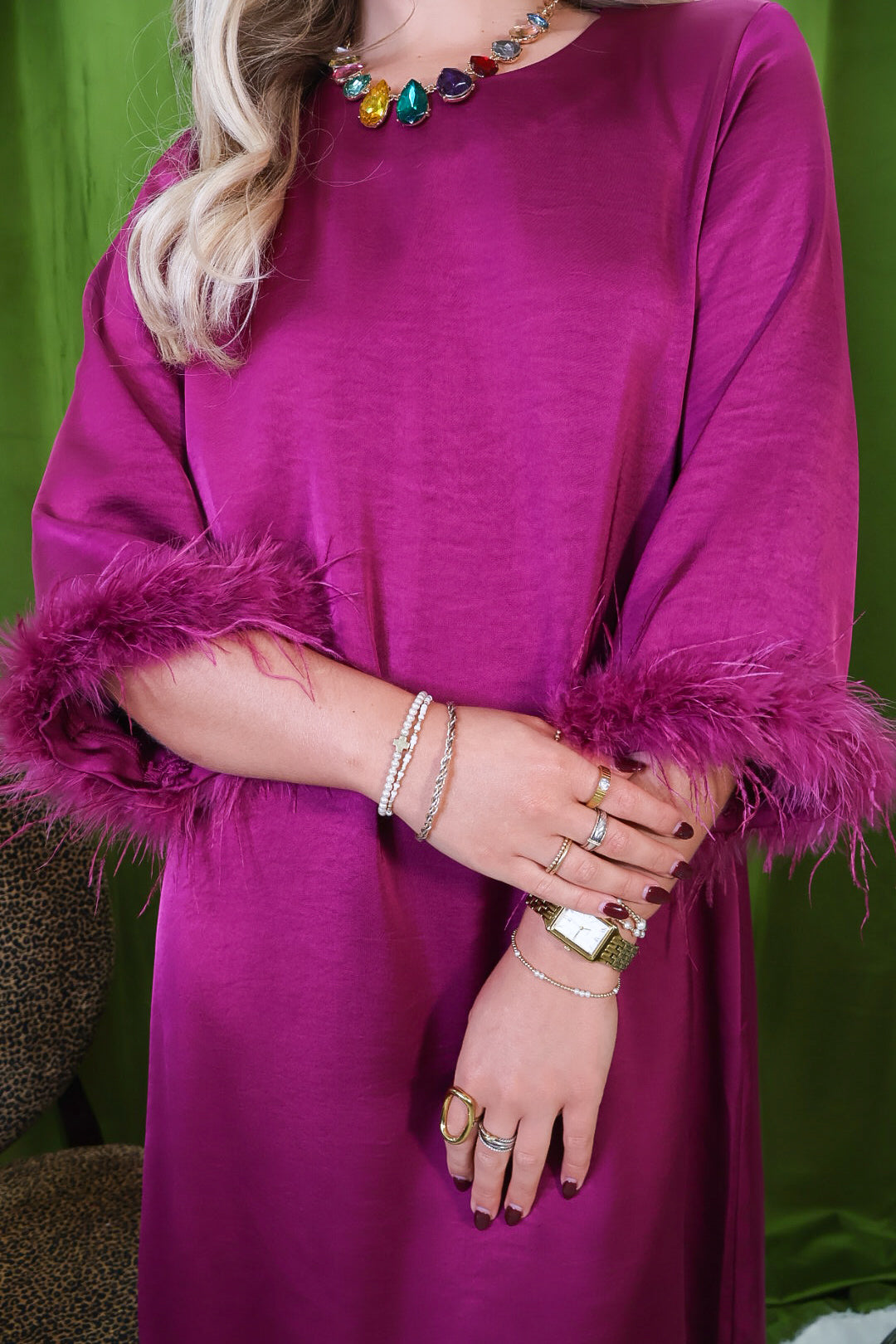 Plum Feather Trim Satin Midi Dress – close-up of feather-trimmed sleeve.