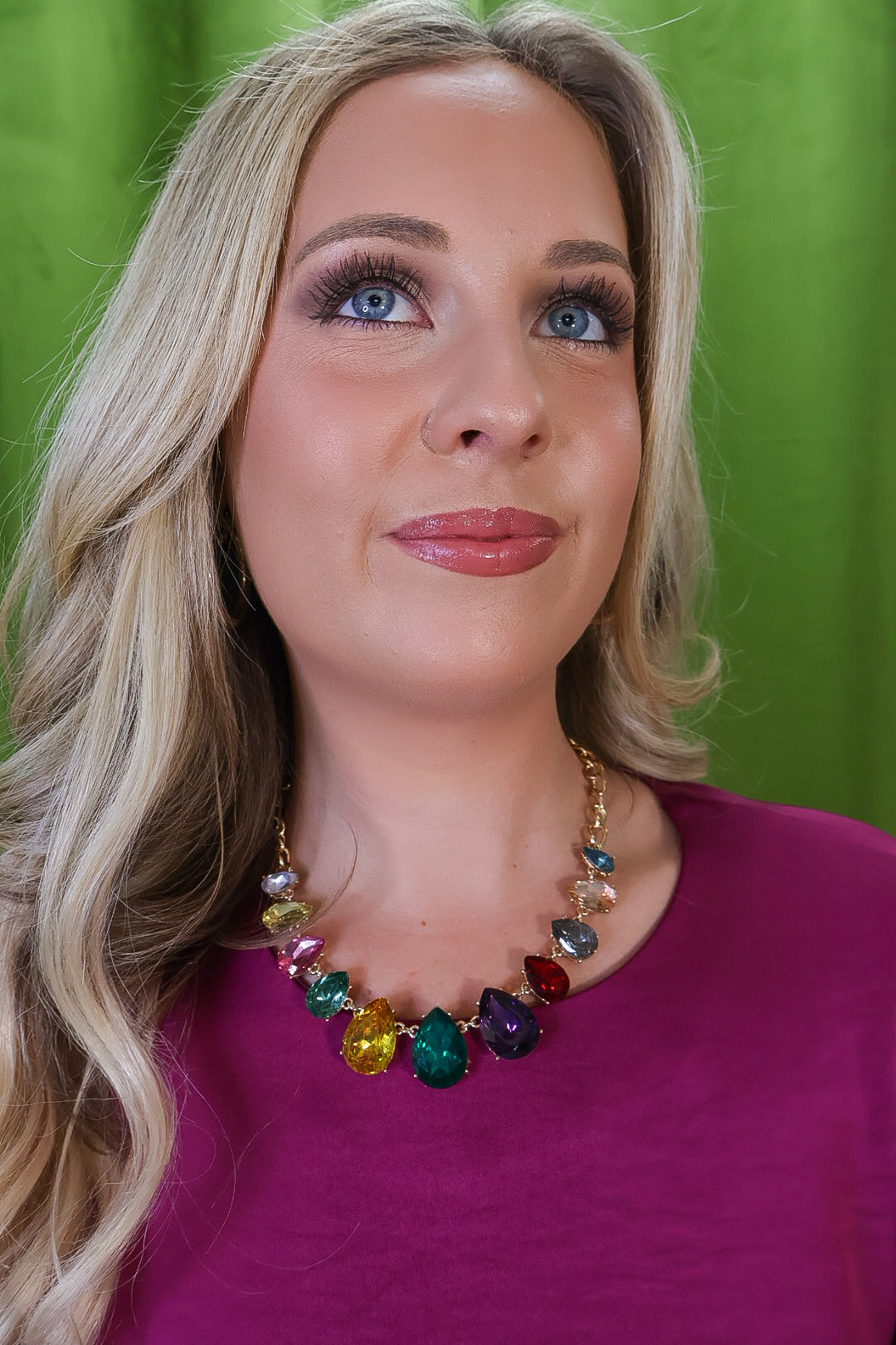 Multicolor teardrop statement necklace with gold-tone chain.